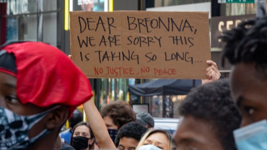 NEW YORK, NY - AUGUST 09: Protesters gather at Times Square to march uptown via the Henry Hudson Parkway on August 9, 2020 in New York City. Protesters took to the streets to demand the arrest of the officer responsible for the death of Breonna Taylor on March 13, 2020 in Louisville, Kentucky. (Photo by David Dee Delgado/Getty Images)