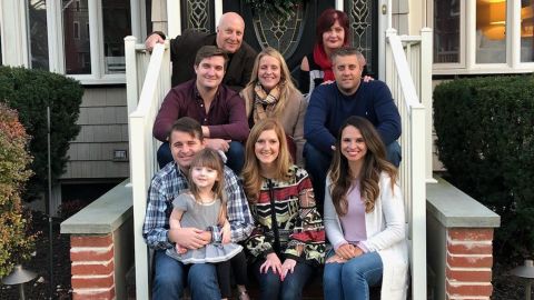 Nicholas Gismondi smiles with his wife, Mary Jane, and their family.