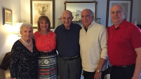 Ralph and Nicholas pose with their sister, Joanne, and parents, Josephine and Nicholas.