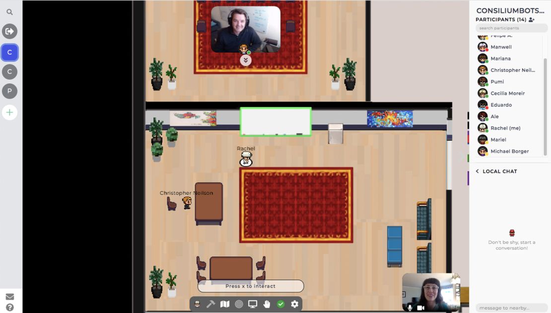 Chris Neilson shows off the ConsiliumBots virtual office on Gather, which combines elements of retro video games with video chat.