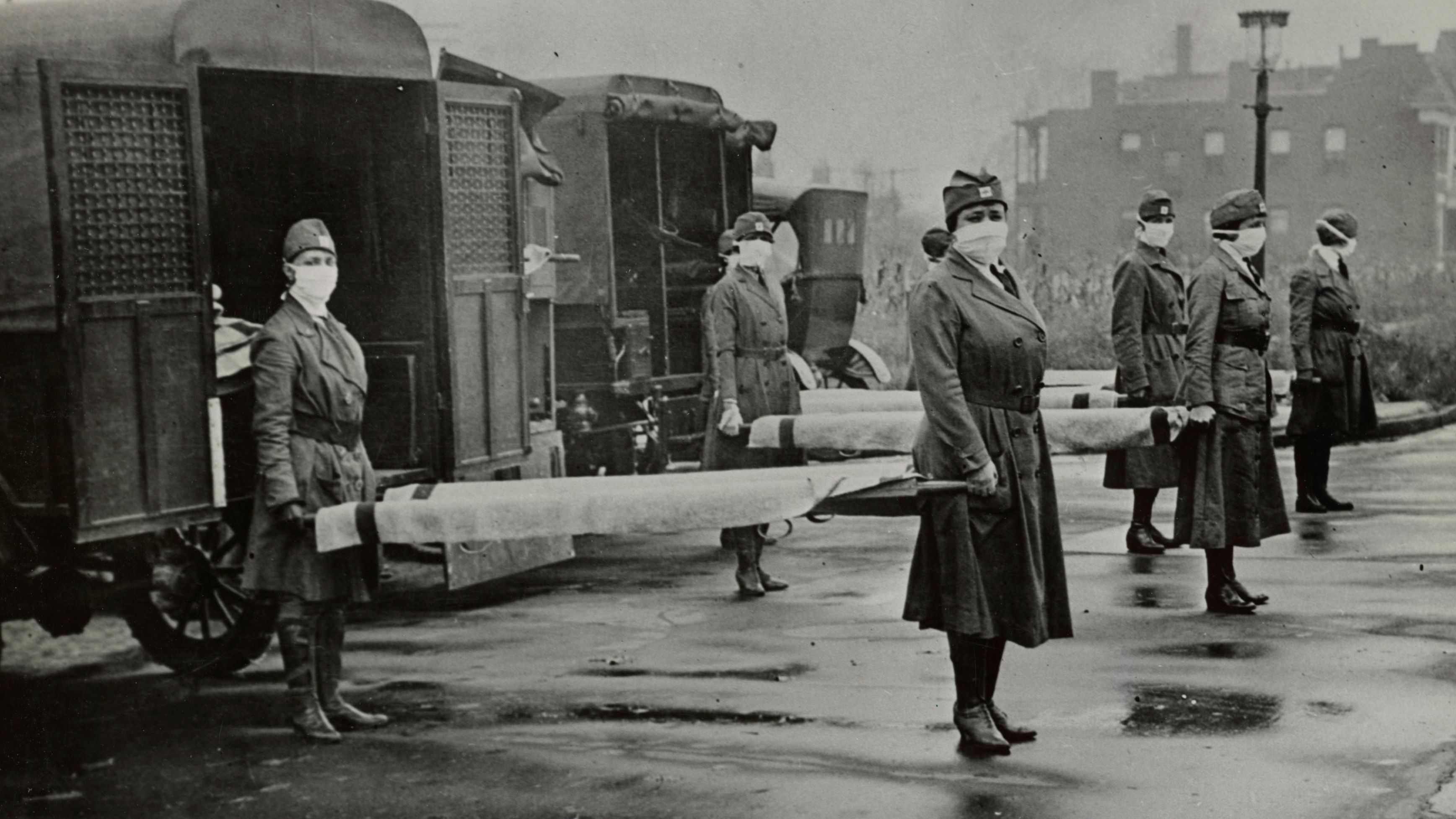 Nurses with stretchers for flu victims in 1918.