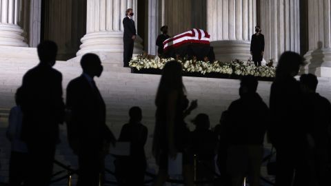 Members of the public pay respects to Associate Justice Ruth Bader Ginsburg as her flag-draped casket rests on the Lincoln catafalque on the west front of the US Supreme Court September 23, 2020 in Washington, DC.