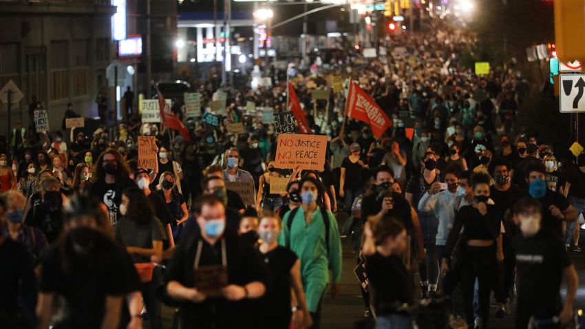 NEW YORK CITY - SEPTEMBER 23: Members of Black Lives Matters (BLM) are joined by hundreds of others during an evening protest against the Kentucky grand jury decision in the Breonna Taylor case outside of the Barclays Center on September 23, 2020 in the Brooklyn borough of New York City. Across the country, protesters have taken to the streets after the grand jury's decision to only charge one Louisville Metro Police officer in the raid in which Taylor was killed. Officer Brett Hankison, who was fired in June, was charged three counts of wanton endangerment for shooting into neighboring apartments. Bond was set at $15,000 for Hankison. Taylor, a 26-year-old emergency medical technician, was killed in her home during a no-knock raid on March 13, 2020. (Photo by Spencer Platt/Getty Images)