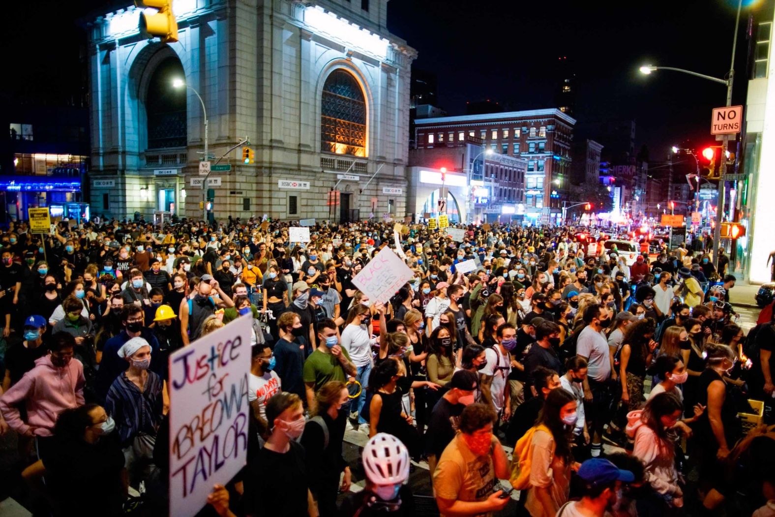 Demonstrators march during a protest in New York over a Kentucky grand jury's decision not to indict any police officers for the killing of Taylor.