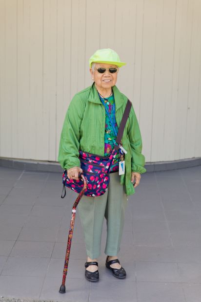 Sui Chen Shen, pictured in Vancouver's Chinatown, wearing an apple green jacket over a shirt made by her friend from leftover fabric. 