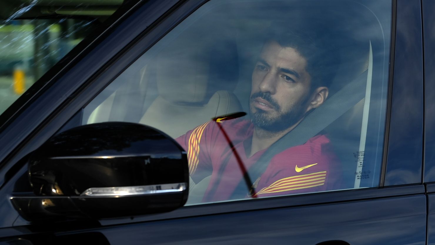 Luis Suarez arrives at a Barcelona training session earlier this month. 