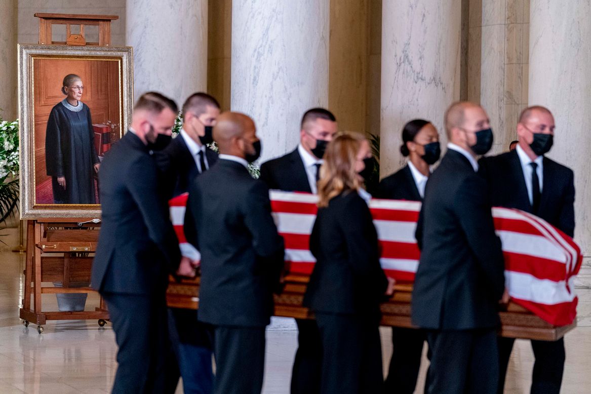 The flag-draped casket of Justice Ruth Bader Ginsburg is carried through the Great Hall at the Supreme Court in Washington on Wednesday, September 23. <a href="https://www.cnn.com/2020/09/18/politics/ruth-bader-ginsburg-dead/index.html" target="_blank">Ginsburg died last week</a> due to complications of metastatic pancreatic cancer. She served on the court for more than 27 years. <a href="https://www.cnn.com/2020/09/23/politics/gallery/ruth-bader-ginsburg-memorials/index.html" target="_blank">In photos: Saying goodbye to Ruth Bader Ginsburg</a>
