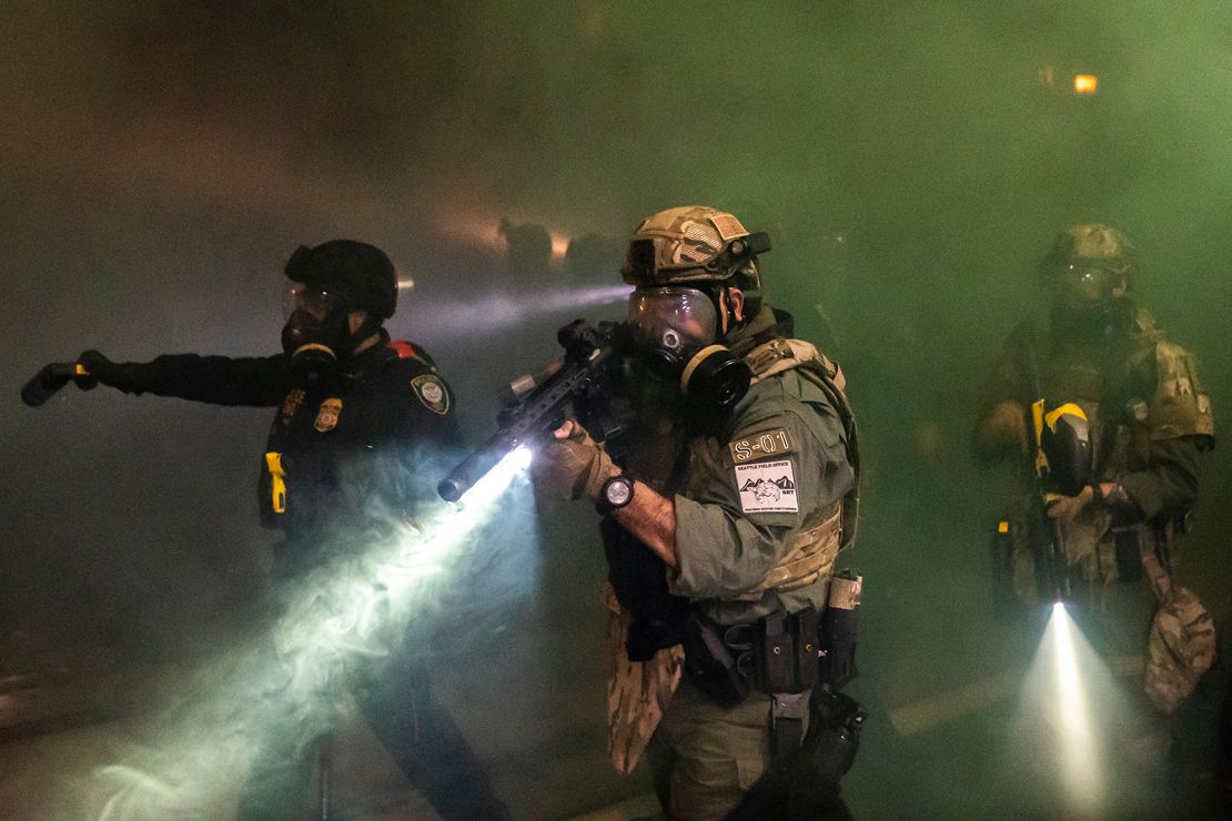 Federal officers disperse a crowd during a protest at the Immigration and Customs Enforcement detention facility on September 18, 2020 in Portland, Oregon.