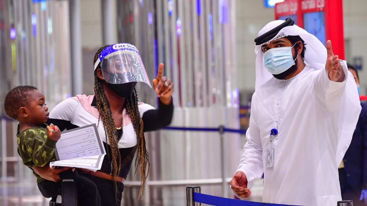 A tourist receives instruction at Dubai airport in the United Arab Emirates.