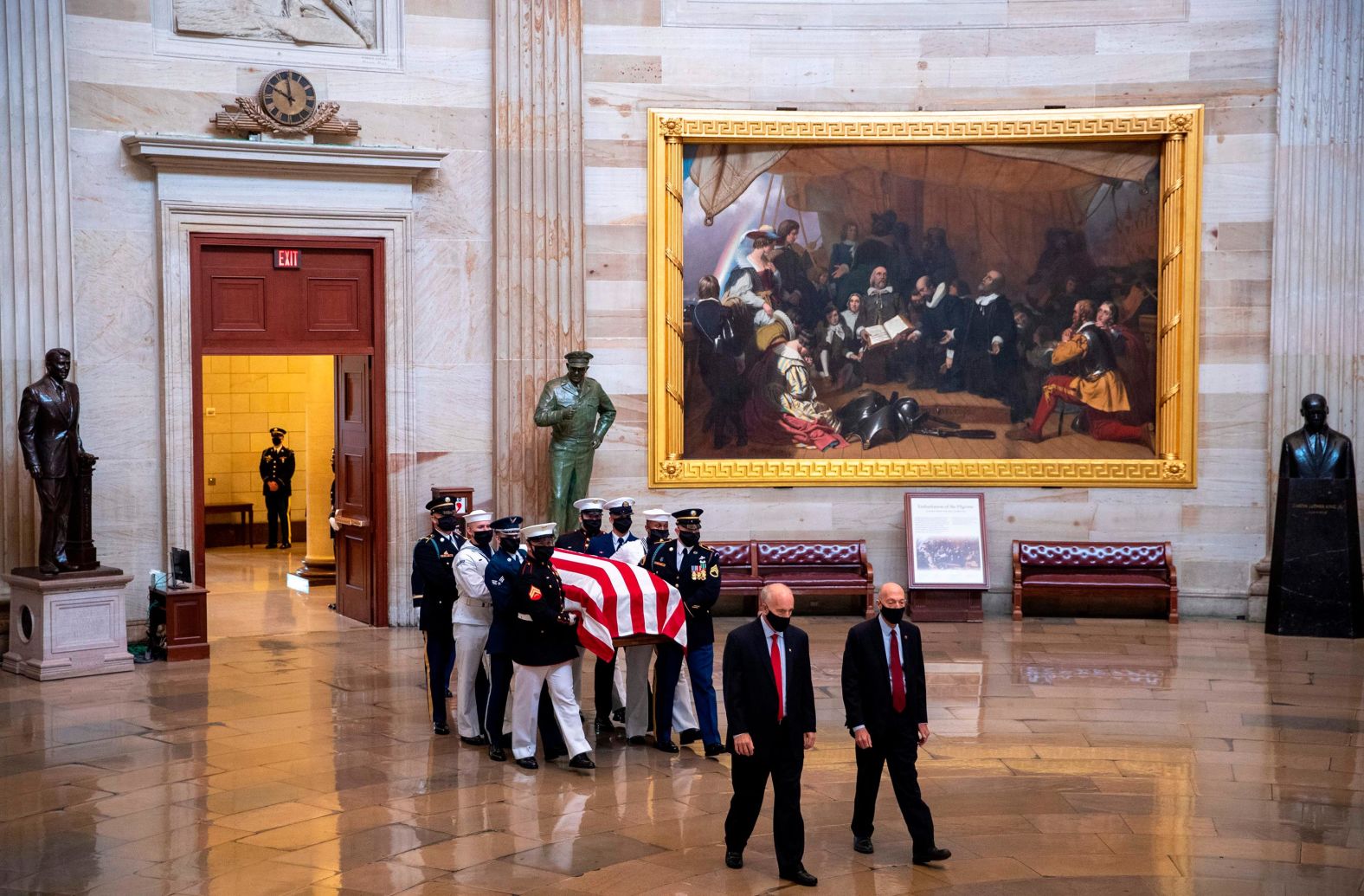 Ginsburg's casket is carried through the US Capitol rotunda.