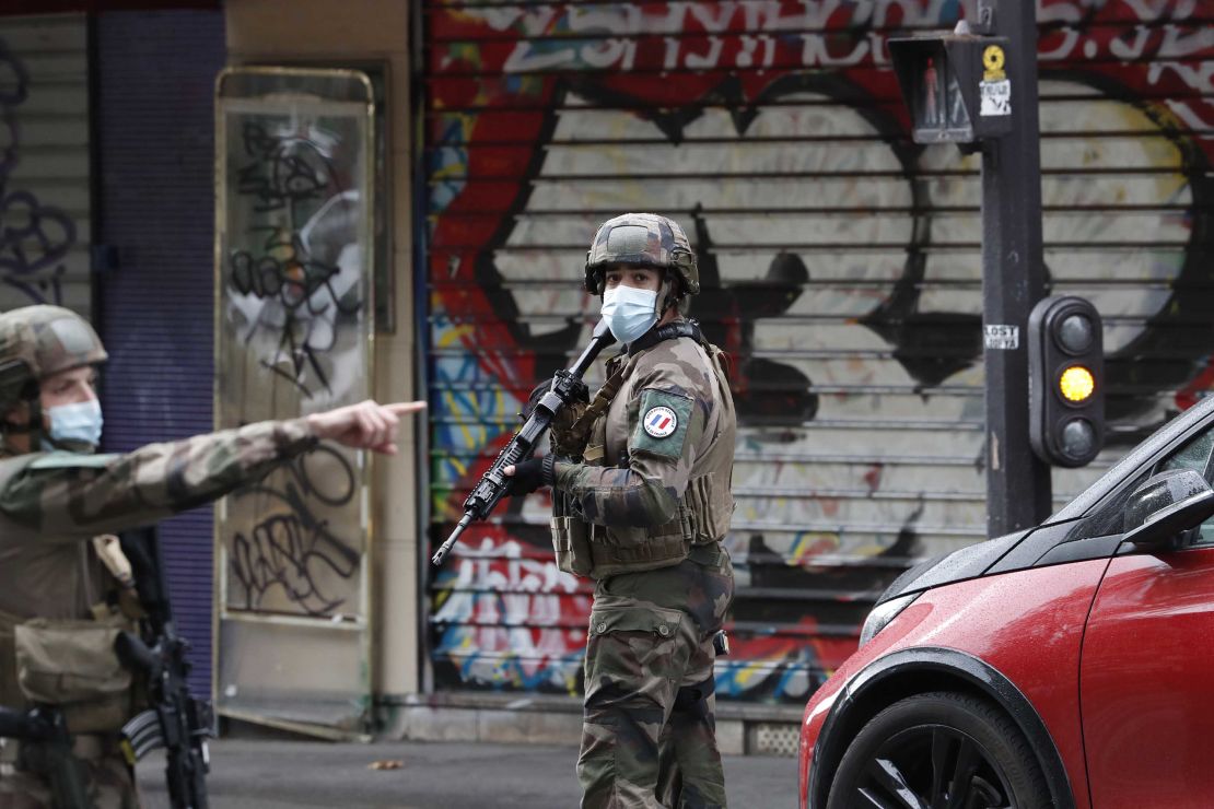 Soldiers patrol Paris after the knife attack.