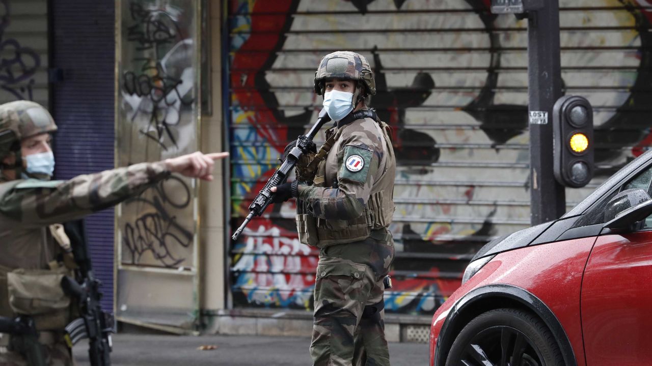 Soldiers patrol Paris after the knife attack.