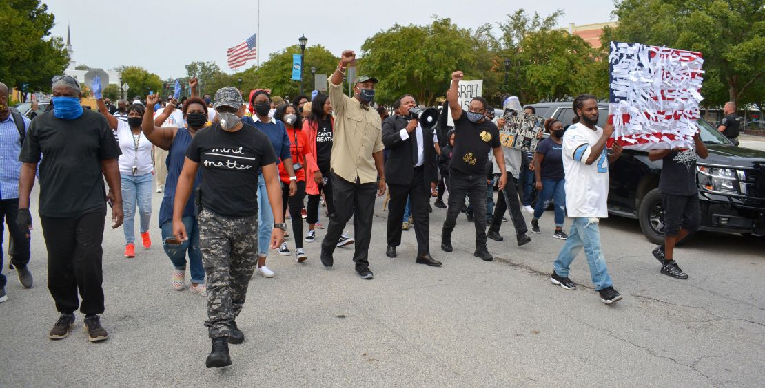 Protesters march in downtown Sylvania, Georgia, on September 19, 2020 over the shooting of Julian Lewis.