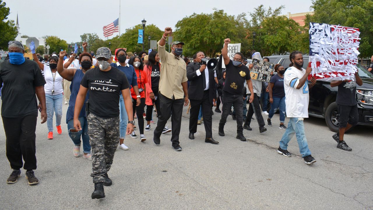 Protesters march in downtown Sylvania, Georgia, on September 19, 2020 over the shooting of Julian Lewis.