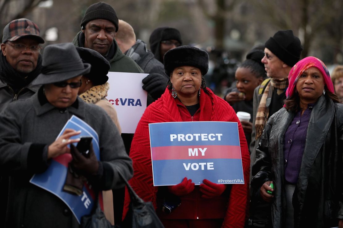 Alabama residents pictured standing in line outside the U.S. Supreme Court for the chance to hear oral arguments in Shelby County v. Holder on February 27, 2013 in Washington, DC. In this case, the Supreme Court struck down a provision of the landmark Voting Rights Act that required certain states and localities with a history of racial discrimination to first get federal approval of any changes to voting laws and practices before they took effect.(Credit: Chip Somodevilla/Getty Images)