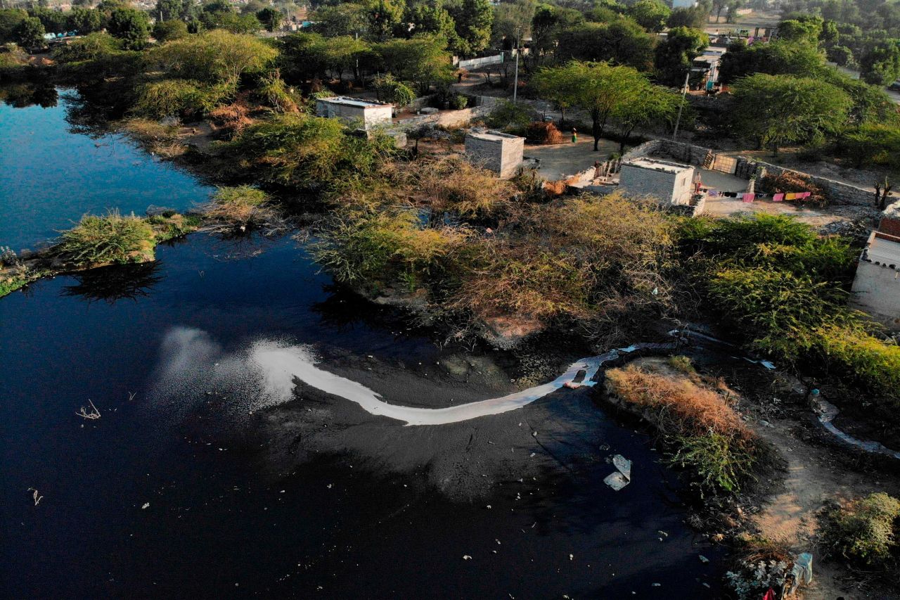 Waste from textile factories released into a river in Sanganer village on the outskirts of India's Jaipur in December 2019.