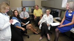 Dr. Carla Sevin iconsults with her team in the ICU Survivors Clinic at Vanderbilt University Medical Center.