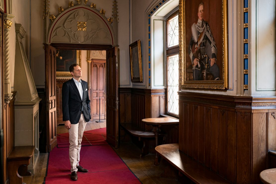 Georg Friedrich, Prince of Prussia, by a painting of his ancestor Crown Prince Wilhelm. 