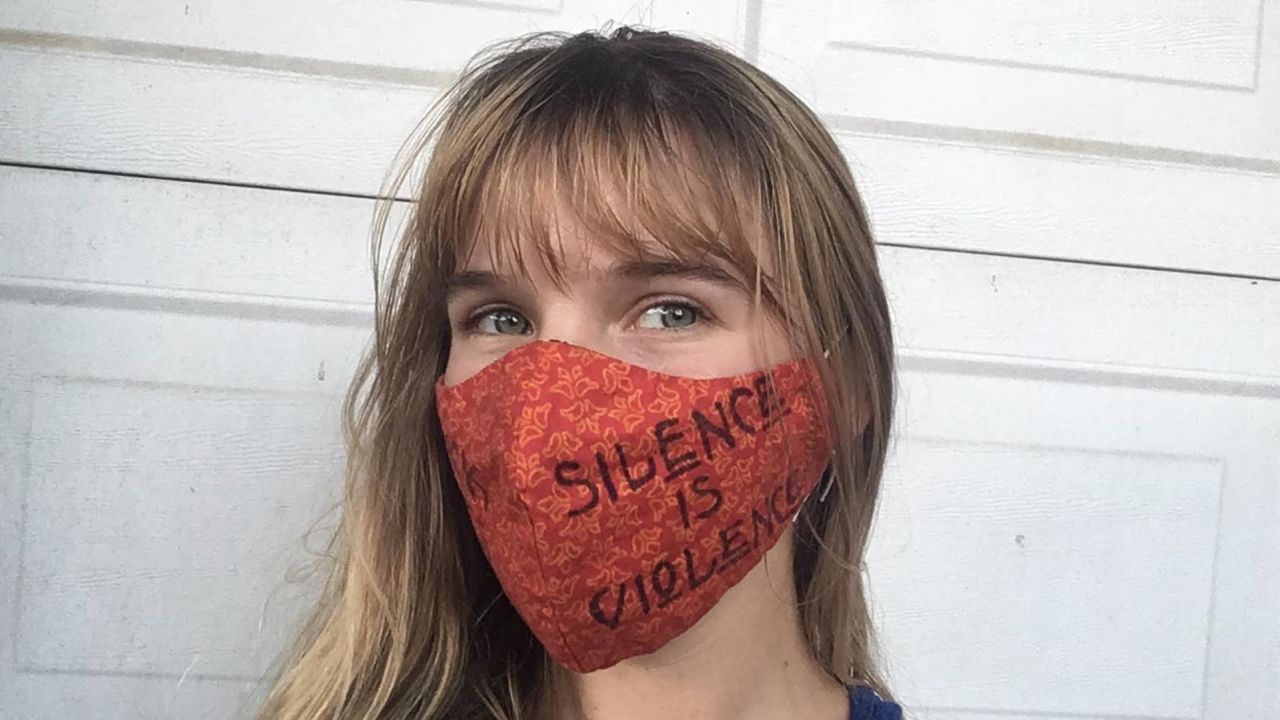 Lillian White wearing her 'silence is violence' mask.
