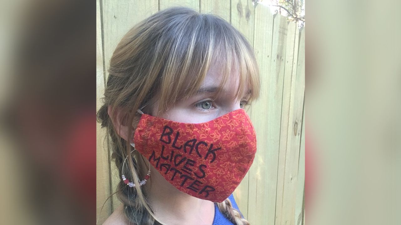 Lillian White was terminated from her job for wearing this Black lives matter mask.