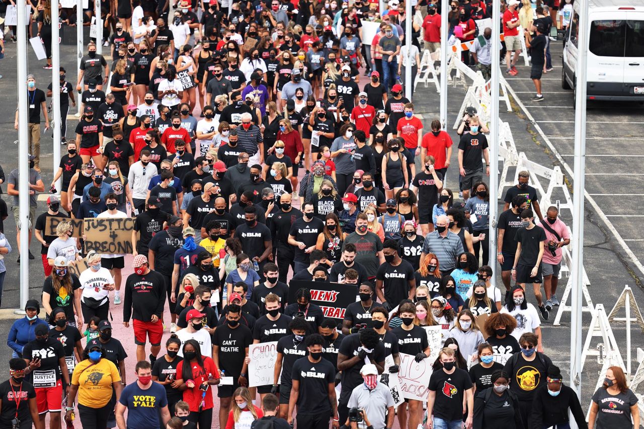 The University of Louisville men's basketball team leads a march calling for justice for Breonna Taylor in Louisville, Kentucky, on Friday, September 25. 