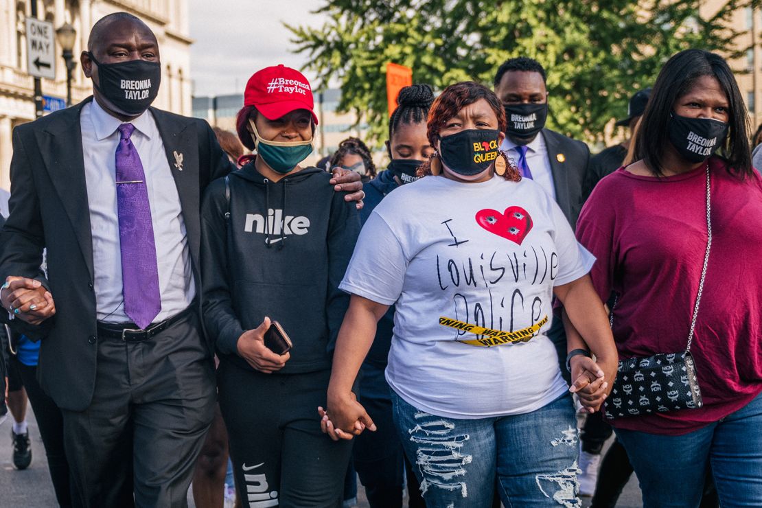 Attorney Ben Crump and 
Breonna Taylor's family.