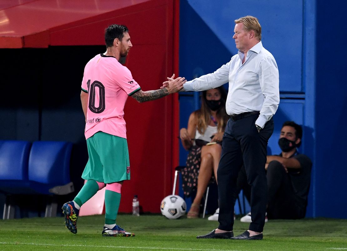 Messi shakes hands with Barca coach Ronald Koeman after he is substituted during the pre-season friendly match between FC Barcelona and Girona at Estadi Johan Cruyff on September 16, 2020.