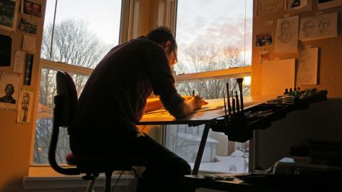 Artist Nate Powell works on the second installment of the "March" trilogy. (Courtesy Nate Powell)