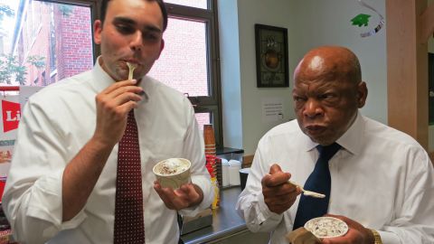 "March" co-authors Andrew Aydin and Rep. John Lewis sample ice cream at Michigan State University in 2014. (Courtesy Nate Powell)