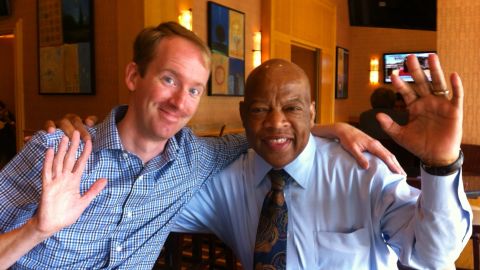 "March" artist Nate Powell with Rep. John Lewis at an industry lunch in 2013. (Courtesy Nate Powell)