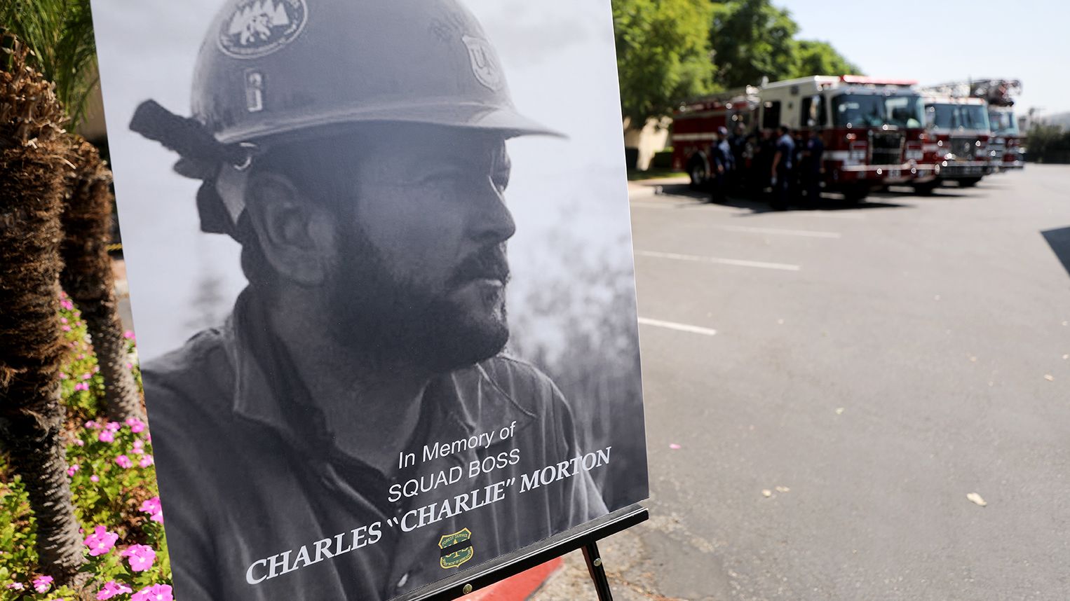 A photograph of Charles Morton, a firefighter killed battling the El Dorado Fire, is displayed at a memorial service in San Bernardino, California, on September 25, 2020. Morton, 39, was a 14-year veteran of the US Forest Service and a squad boss with the Big Bear Hotshot Crew of the San Bernardino National Forest.