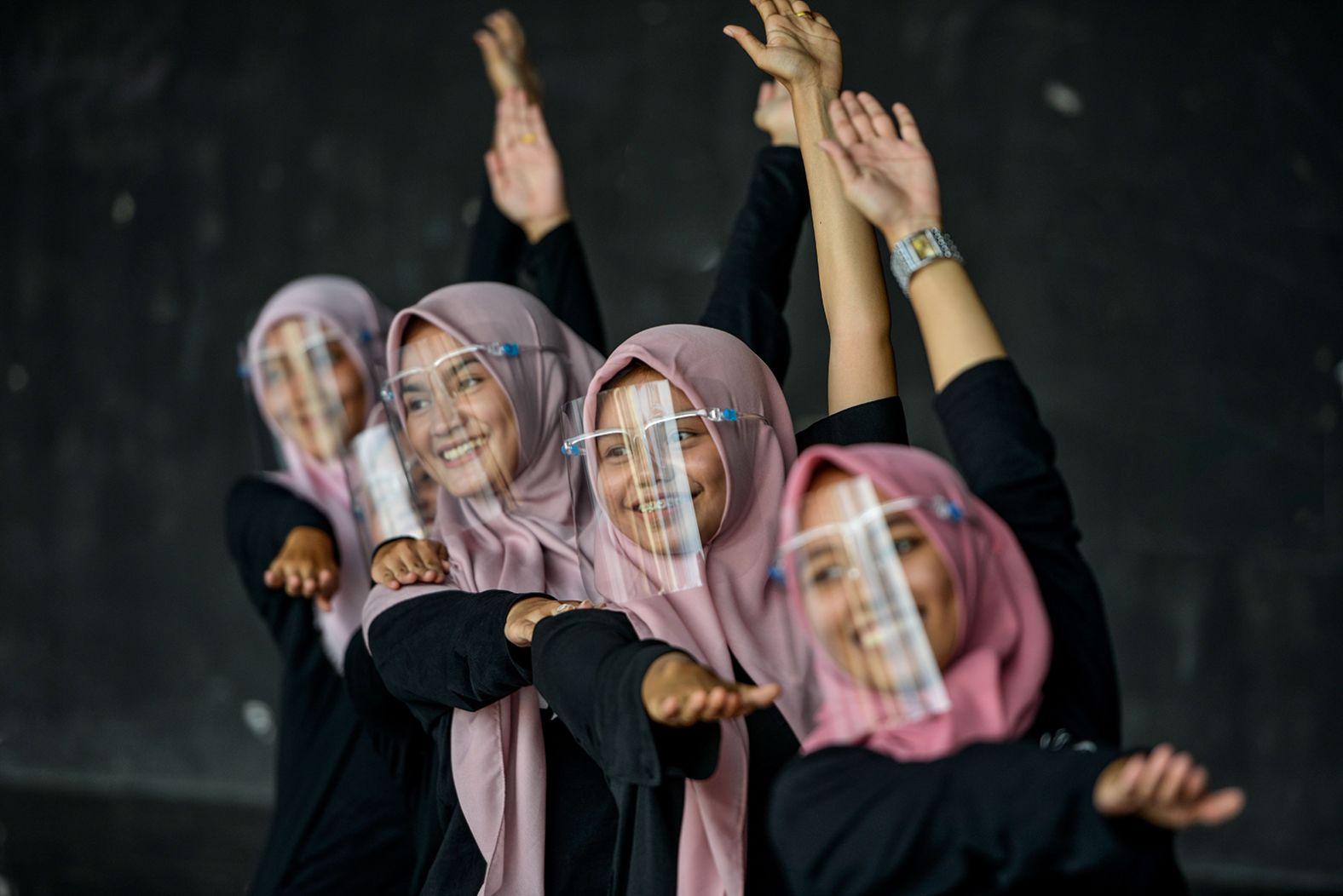Dancers wearing face shields practice in Banda Aceh, Indonesia, on September 26.