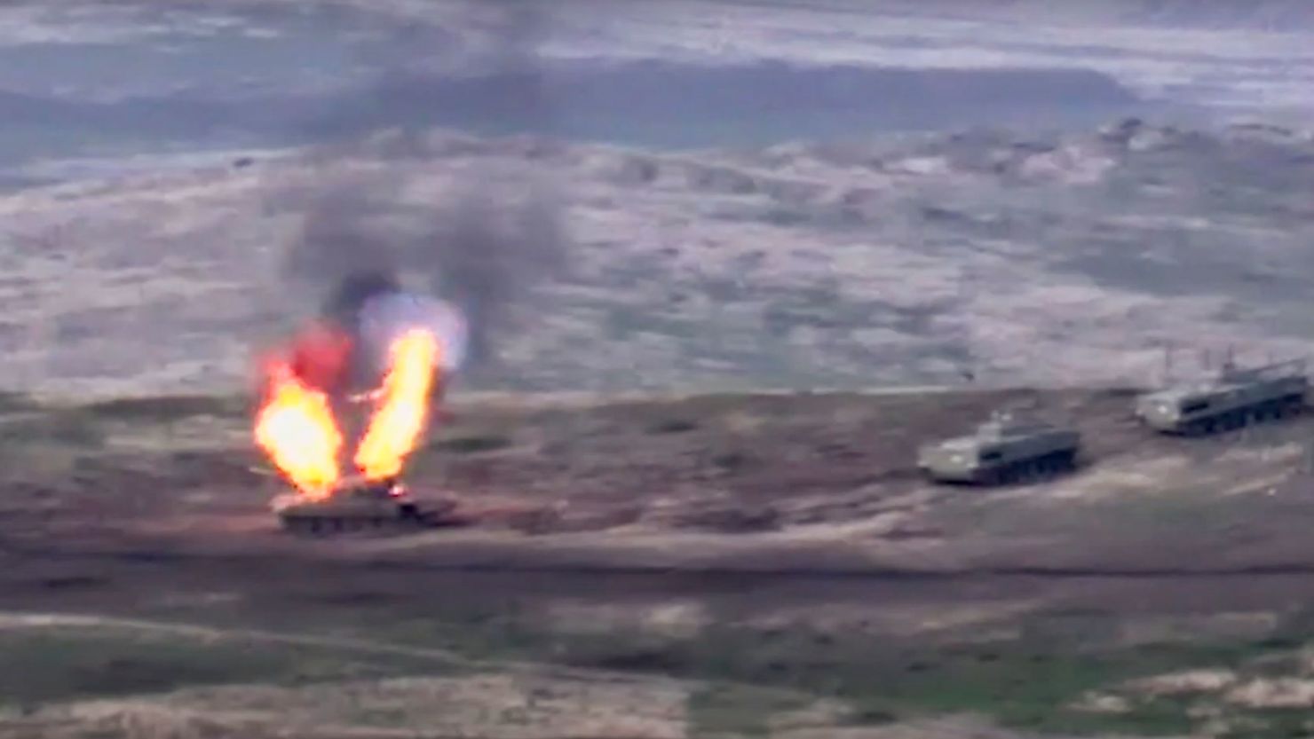 A photo released by the Armenian Defense Ministry appears to show an Azerbaijani tank being destroyed on Sunday, September 27, 2020. 