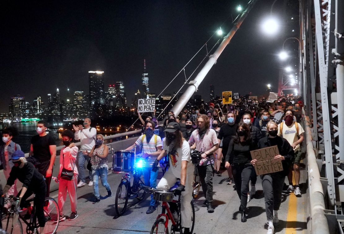 Black Lives Matter protesters from different races marched from the Barclays Center to the Brooklyn Bridge on Saturday night.