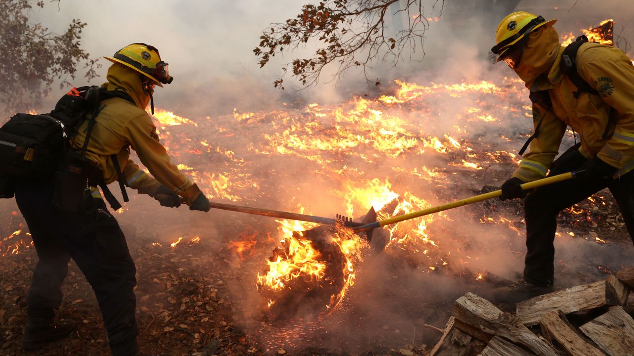 Marin County firefighters battle the Glass Fire on Sunday, September 27, in Calistoga, California.