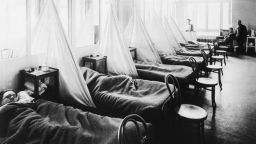 Patients lie in Influenza Ward No. 1 in U.S. Army Camp Hospital No. 45 in Aix-les-Baines, France, during World War I. | Location: Aix-les-Baines, France.  (Photo by ? CORBIS/Corbis via Getty Images)