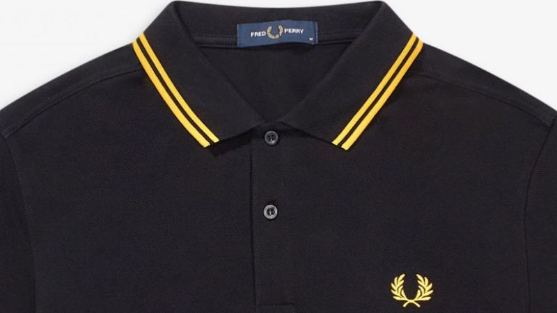 Sandet På forhånd Maxim Fred Perry stops selling polo shirt associated with the 'Proud Boys' | CNN  Business