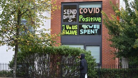 Messages pasted inside the windows of the Oxford Court student residences at Manchester Metropolitan University, after students were told to self-isolate.