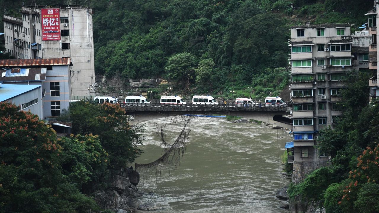 Ambulances wait outside the Songzao Coal Mine after workers became trapped. 