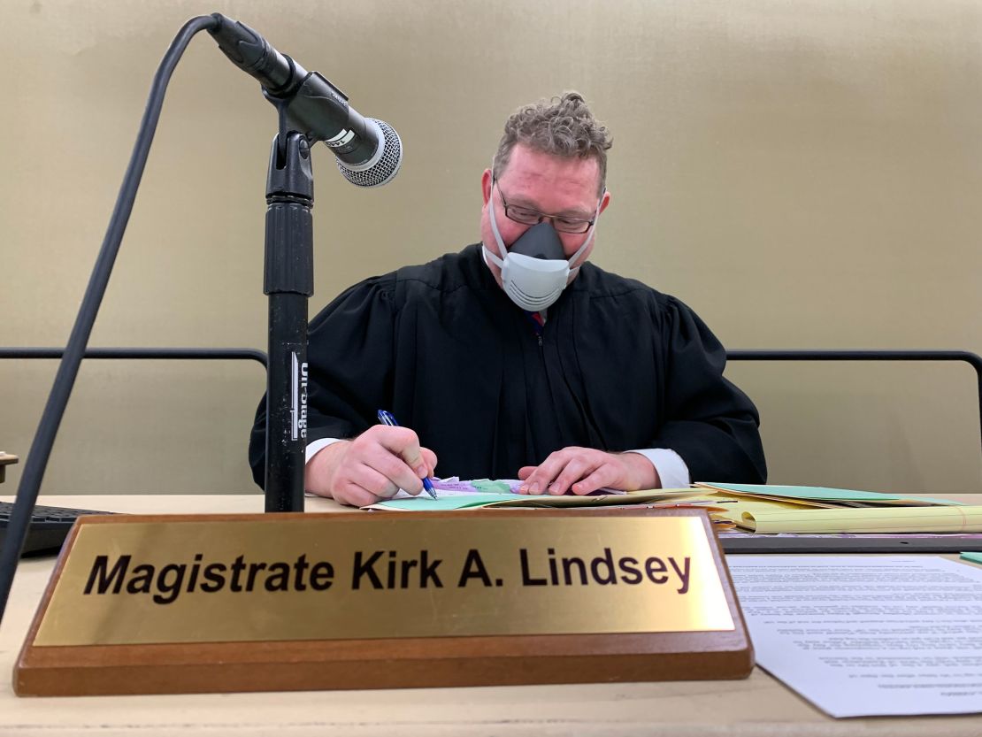 Magistrate Judge Kirk Lindsey hears evictions cases at a temporary courtroom set up at a convention center in Columbus, Ohio, on September 23.