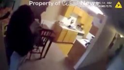 Image from a video shows an officer, which Vice News says appears to be former Louisville police Detective Brett Hankison, entering Breonna Taylor's apartment after the shootings and ask about shell casings that are on the floor. He's soon told by another unidentified officer that he should "back out" until the department's Public Integrity Unit arrives. Hankison's attorney declined to comment on the video. 