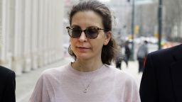 Clare Bronfman, center, a member of NXIVM, an organization charged with sex trafficking, arrives at Brooklyn Federal Court, Monday, April 8, 2019, in New York. Jury selection is set to begin Monday for the trial, expected to detail sensational allegations that a cult-like group based in upstate New York recruited sex slaves for its spiritual leader. (AP Photo/Mark Lennihan)