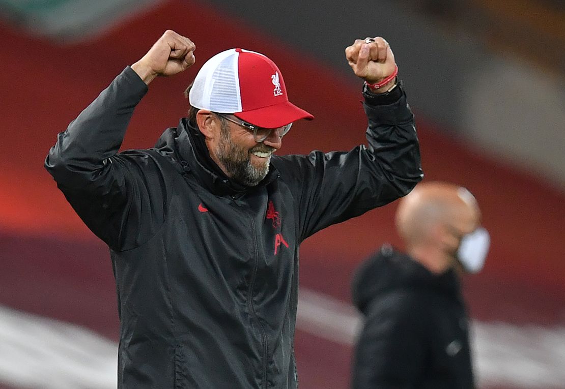 Liverpool manager Jürgen Klopp celebrates after Roberton's goal. 