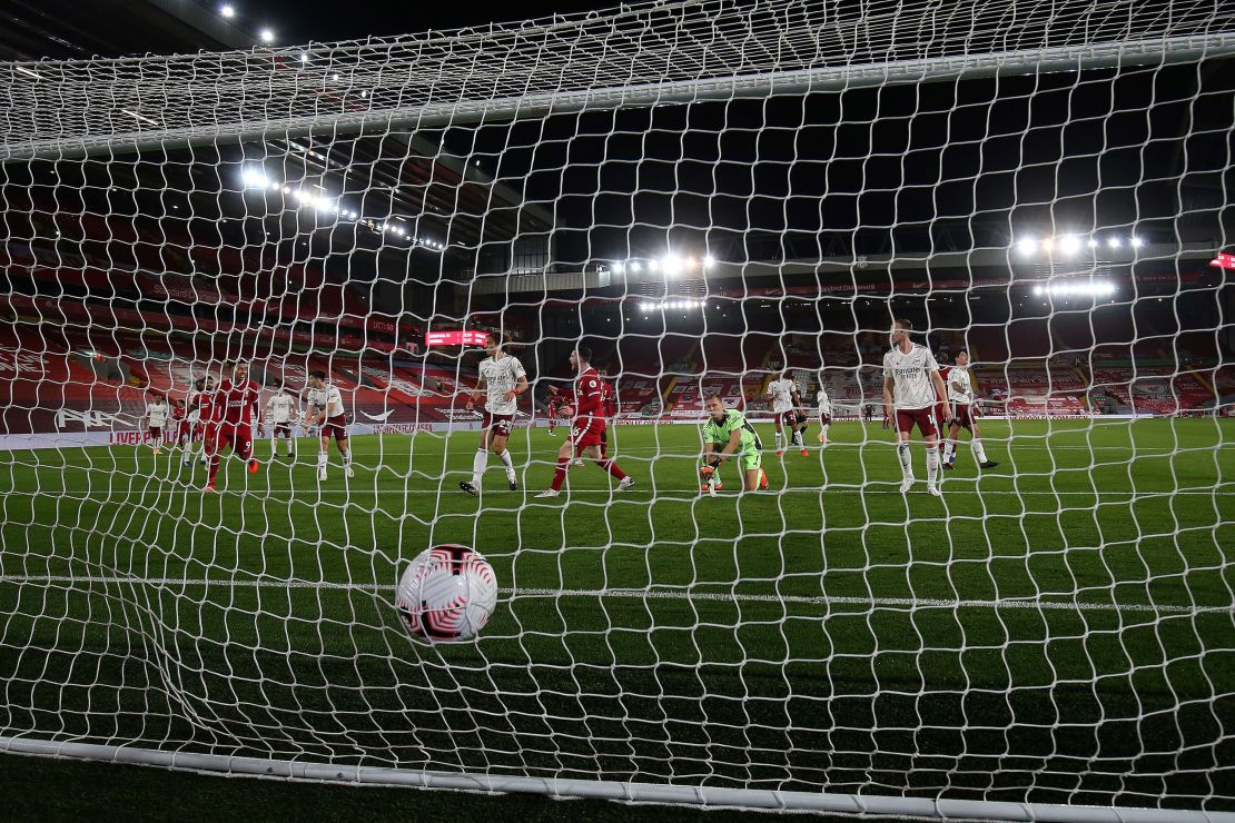 The ball hits the back of the net after Liverpool's Andrew Robertson scores his team's second goal against Arsenal.
