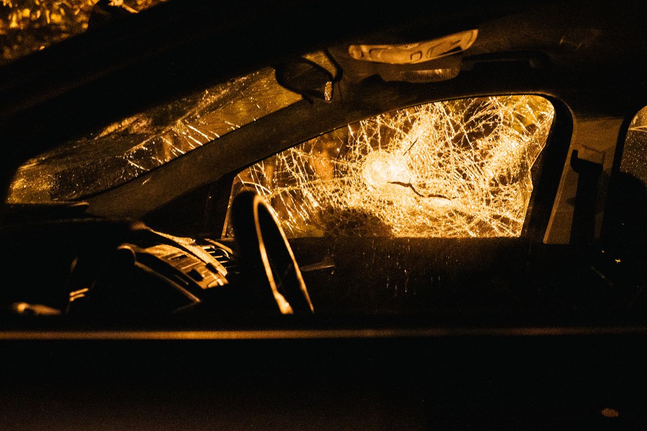 A car window is smashed following protests in Louisville, Kentucky, on September 26. Mayor Greg Fischer mandated a city-wide curfew restricting protestors from gathering between the hours of 9 p.m. to 6:30 a.m.