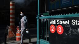 People walk along Wall Street in lower Manhattan on September 21, 2020 in New York City. As parts of Europe prepare for another lockdown due to a resurgence in COVID-19 cases, markets across the globe fell due to the economic uncertainty. The Dow Jones Industrial Average fell over 900 points in morning trading.  (Photo by Spencer Platt/Getty Images)