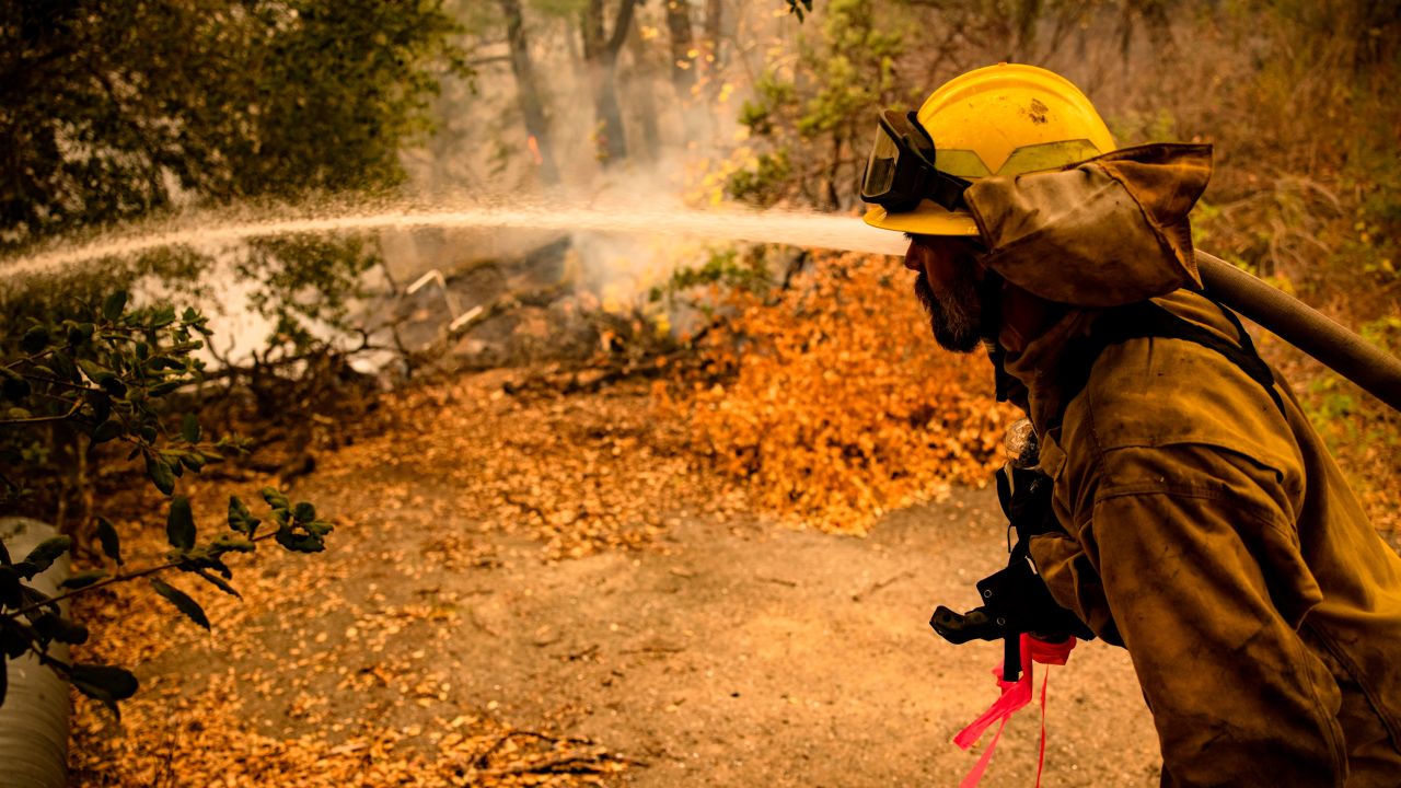 Firefighters scrambled to save homes threatened by the Glass Fire in Napa Valley, California on Tuesday.