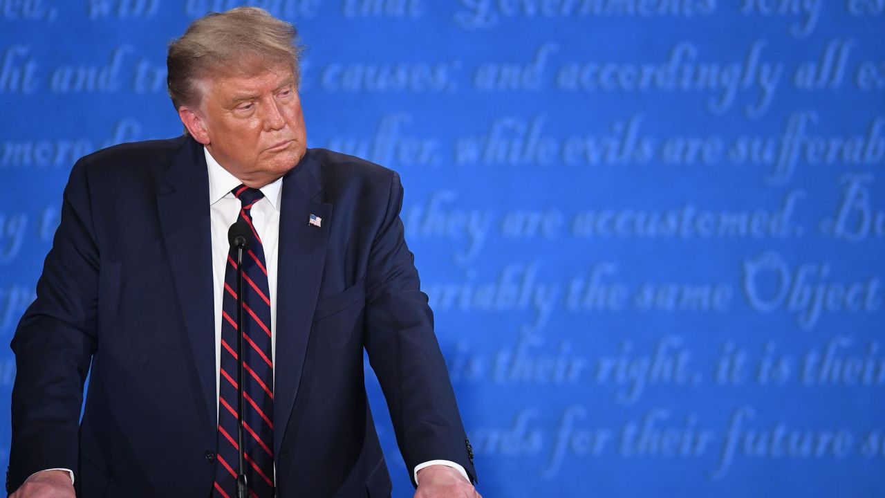 US President Donald Trump looks on during the first presidential debate at Case Western Reserve University and Cleveland Clinic in Cleveland, Ohio, on September 29, 2020.