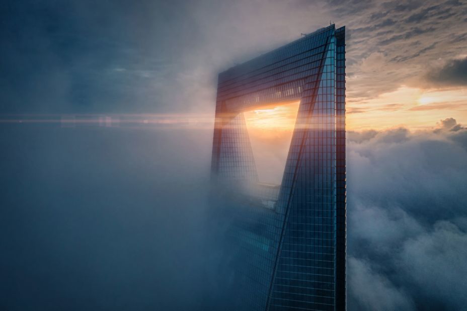 A picture of a Shangai skyscraper in the early morning light, by Rex Zou.