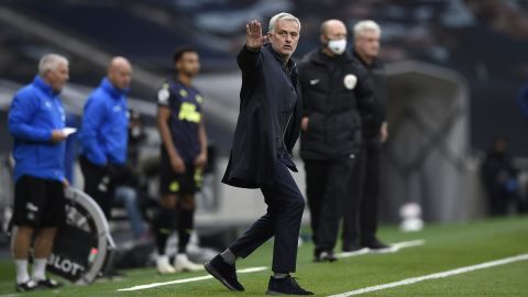 Mourinho gestures on the sidelines during Tottenham's game against Chelsea. 